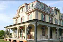brightly painted Victorian hotel