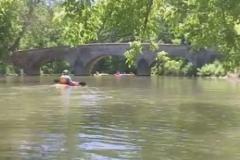 Gentleman kayaking by the Burnside Bridge