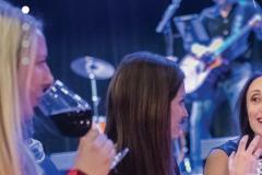 women dining with music