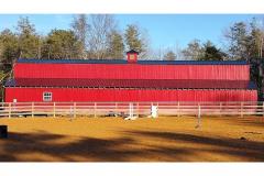 Southern Grace Farm The long red barn at Southern Grace Farm
