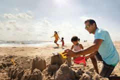 Family building sandcastle