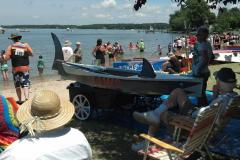 Cardboard Boat Races People racing boats