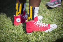 Maryland flag socks and red Converse sneakers