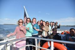 People on a boat crossing the bay to St. Michaels