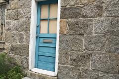 Historic Ellicott City A Blue Door and Stone Wall in Ellicott City