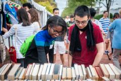 People looking at books at the Baltimore Book Festival