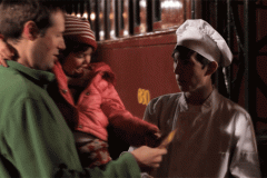 Dad and child boarding train