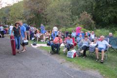 People listening to concert outside