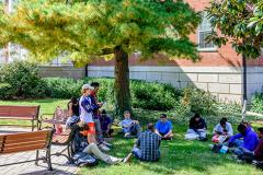 Students gathered for an outdoor discussion