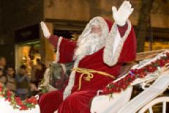 Kris Kringle spreads holiday cheer during the parade in Frederick Kris Kringle spreads holiday cheer during the parade in Frederick