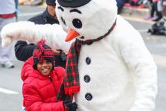 Boy with Frosty the Snowman