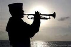 Navy Sailor playing taps