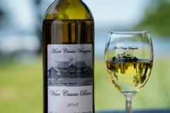 Close-up of a Bottle of Cascia Wine with a Glass Close-up of a Bottle of Cascia Wine with a Glass