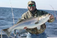 Bill Miles displaying his rockfish Bill Miles displaying his rockfish