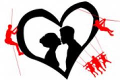 Pictures of a heart with a couple kissing in the middle of it with characters climbing, swinging and zip lining on the sides.