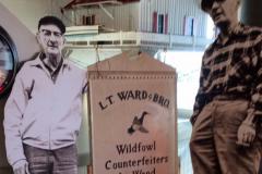 men next to sign