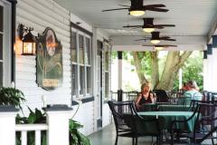 Westlawn Inn, North Beach Couple on porch of Inn