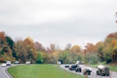 Vehicles traveling on a Maryland highway.