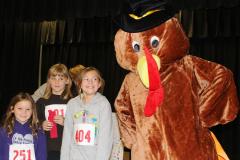 Kids with a turkey mascot