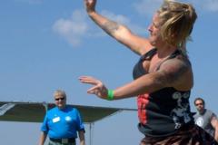 woman throwing rock