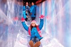Girl sliding on ice National Harbor ice