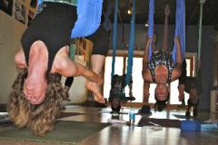 Aerial Yoga Small group practicing aerial yoga