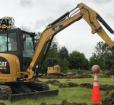 Track excavator with basketball Photo