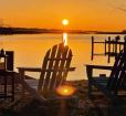 Your Gorgeous Sunrise and Waterfront Adirondack Chair Awaits! Photo