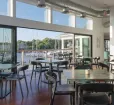 Interior view of waterfront dining room. Photo