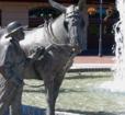 Statue of boy and donkey Photo