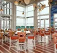 Interior of Blue Point Provision with large glass windows. Photo