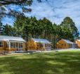 Cabins with private grills, fire pit, screened in front porch Photo