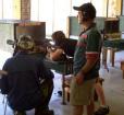 Shooters at the shooting range. Photo