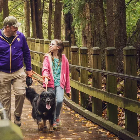 Family with a Dog at Swallow Falls State Park