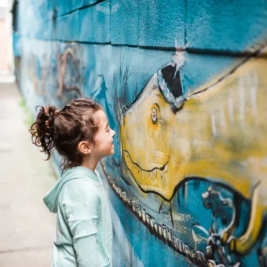 A Young Girl Makes A New Friend on the Public Art Trail