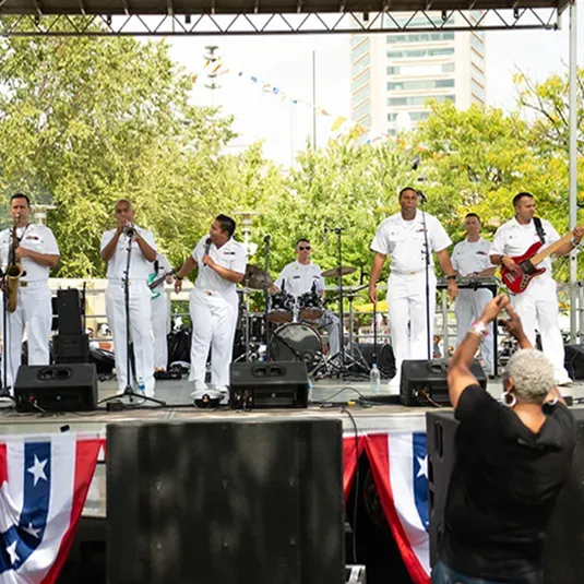 U.S. Navy Band playing on stage.