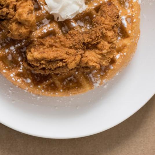 A plate chicken and waffles