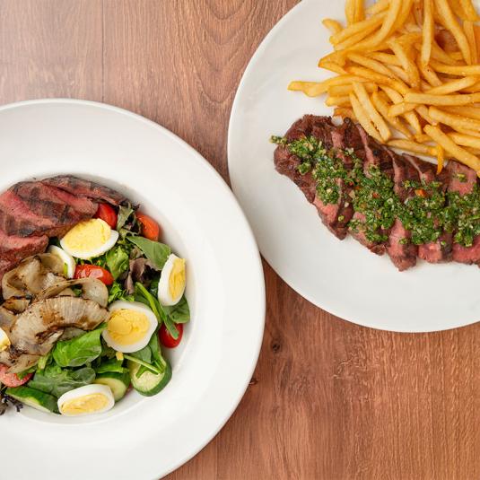 Matchbox salad, steak, and french fries