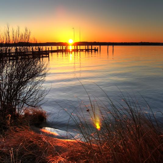 This idyllic view of the sunrise over Benedict on the Patuxent River decries the chaos of March 1812, when the British landed here to invade Washington, D.C.