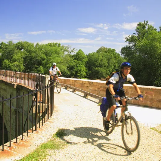 Biking across the Monocacy Aqueduct on the C&amp;O Canal Towpath
