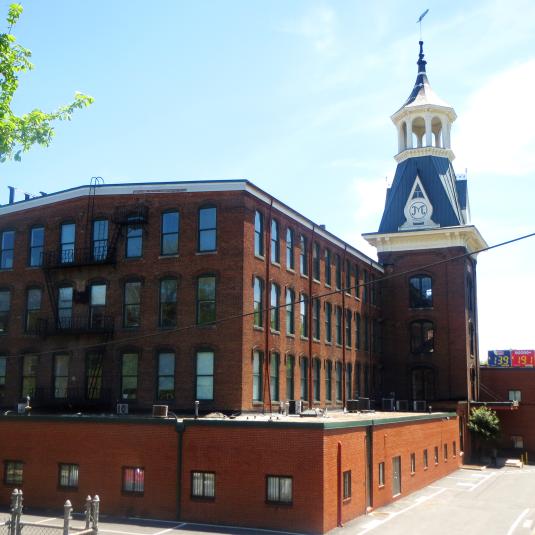 The re-developed 19th-century Meadow Mill in Baltimore has an artful ambiance and creative energy within its shops, residences, and offices, including an upscale restaurant and glassblowing studio.