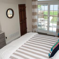 Beautiful balcony with views of Swan Creek from the Manor House building. Photo