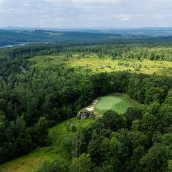 Overview of Lodestone Golf Course with Deep Creek Lake in the background Photo