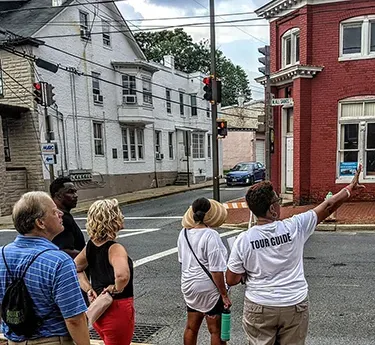 Dee Jenkins leading AARCH Society walking tour in Frederick