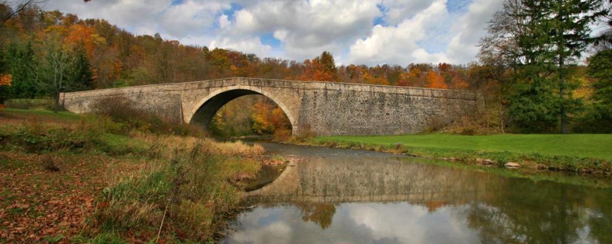 This historic stone-arched Casselman River Bridge in Grantsville once carried horse-drawn carriages and wagons headed westward on the Historic National Road. This historic stone-arched Casselman River Bridge in Grantsville once carried horse-drawn carriages and wagons headed westward on the Historic National Road.